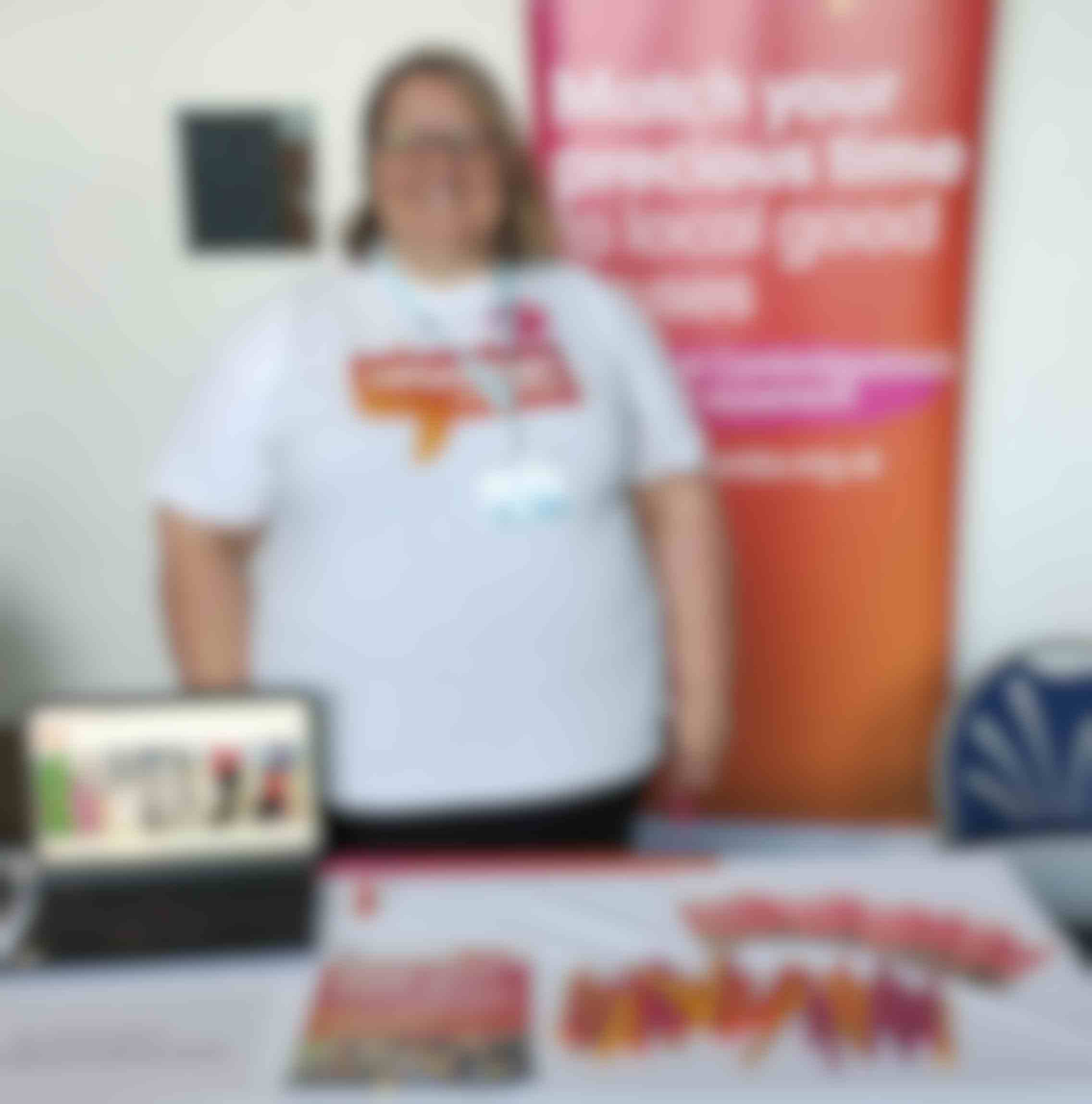 Photo of Rima smiling at a Volunteer Cambs event