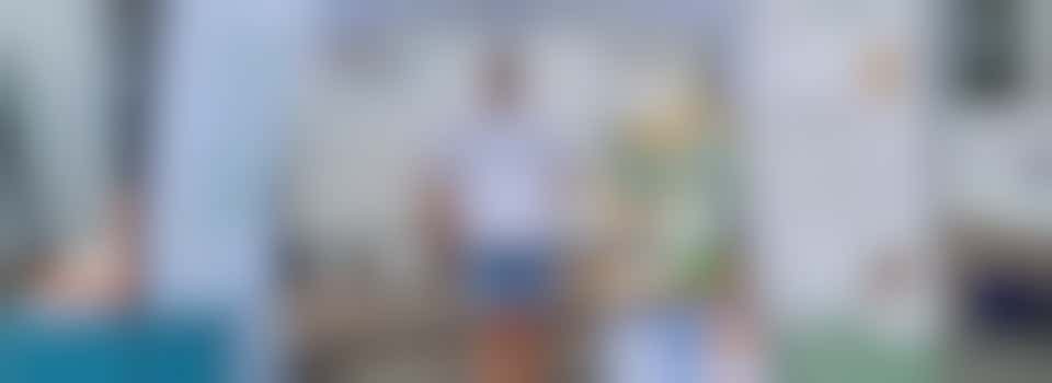 Charity stall volunteer at Northstowe Festival of Running