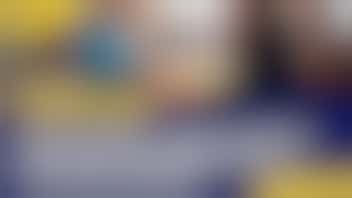 Blue and yellow image showing a volunteer handing a meal to a individual, with the writing GoVo is here – What it means for local volunteering in Buckinghamshire on the image