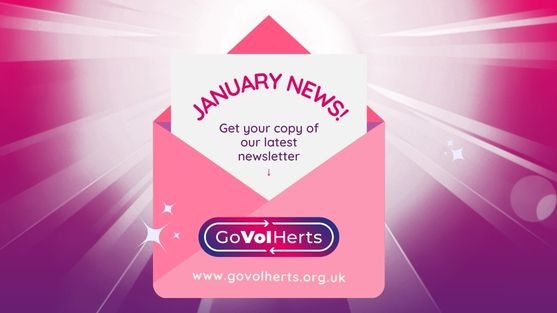 January Newsletter - pink envelope with an white letter coming out the top saying "January News" 