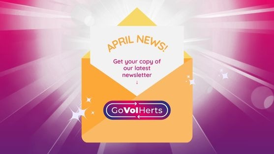 April Newsletter Yellow Envelope opened against a starburst background